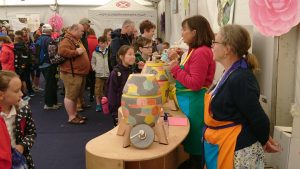 Royal Highland Show, 2017. Lorraine Russell (on right), Fife member, helping out with honey tasting