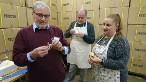 SBA Wax Workshop, 2017. Jeff Baxter, Dunfermline (left) and daughter Karen with Gavin Ramsay (centre) making beeswax flowers